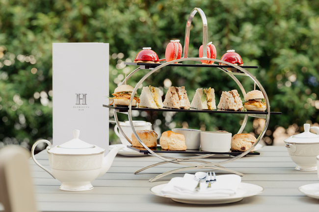 Cakes and deserts on a tray on a table